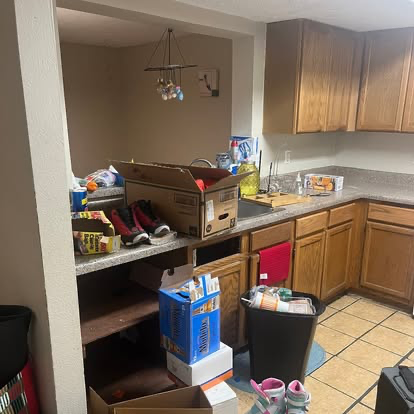 Apartment kitchen before a cleanout